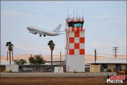A rare US Navy Boeing C-20A Clipper transport takes off behind the iconic NAF El Centro ATC Tower. - Photo by Britt Dietz A rare US Navy Boeing C-20A Clipper transport takes off behind the iconic NAF El Centro ATC Tower. - Photo by Britt Dietz
